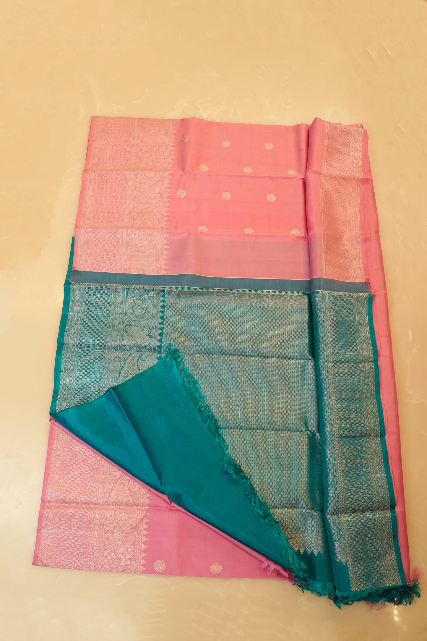Kanjivaram Silk Saree โ Baby Pink & Teal Green With Rich Silver Zari Work